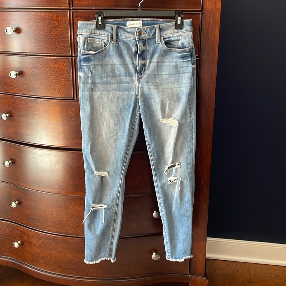 Studio Blue ankle distressed skinny jeans.